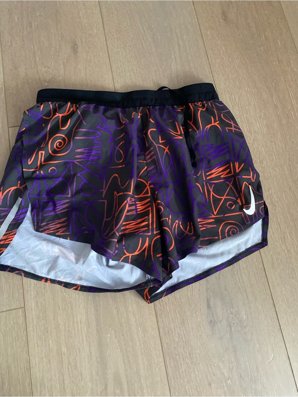 Nike Women’s Purple Shorts with Orange Abstract Print